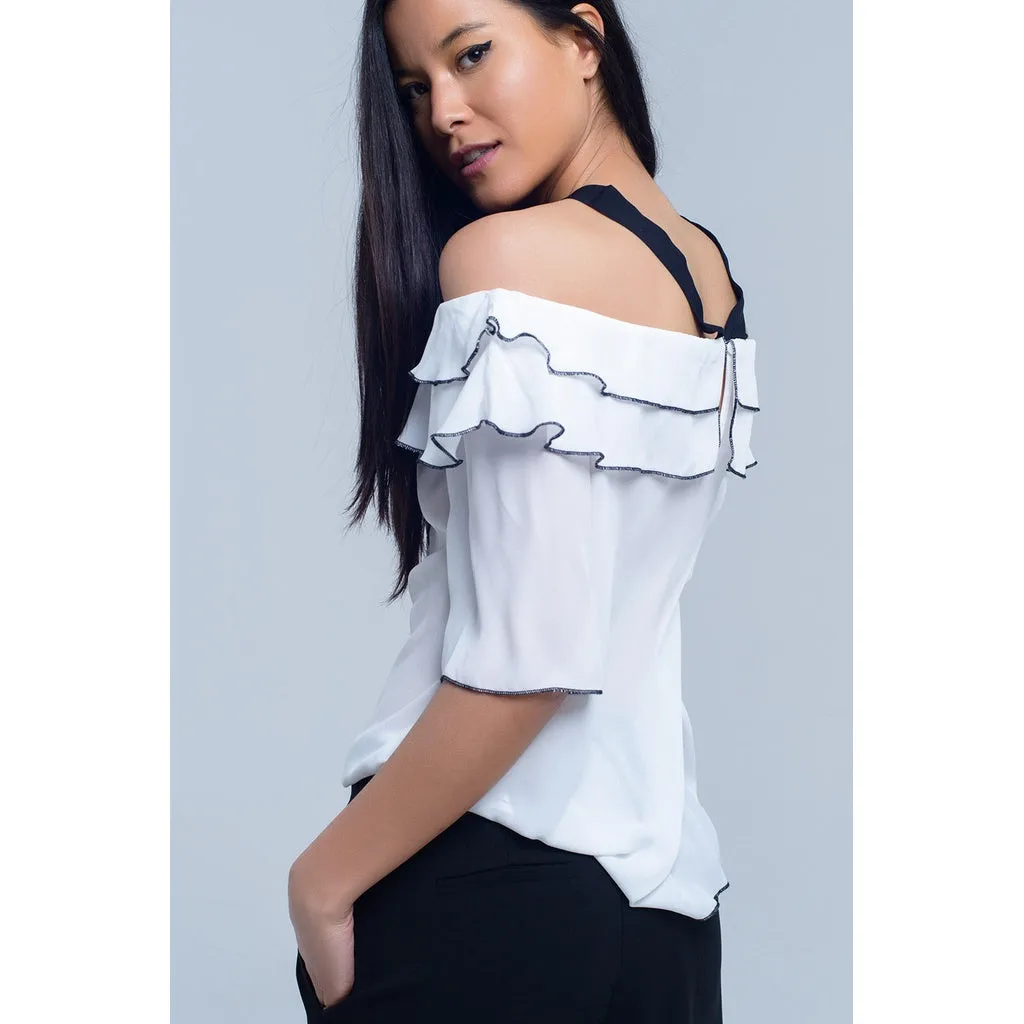 White top with black contrast trim