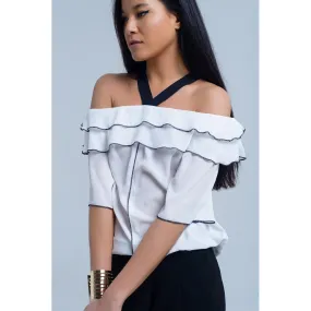 White top with black contrast trim